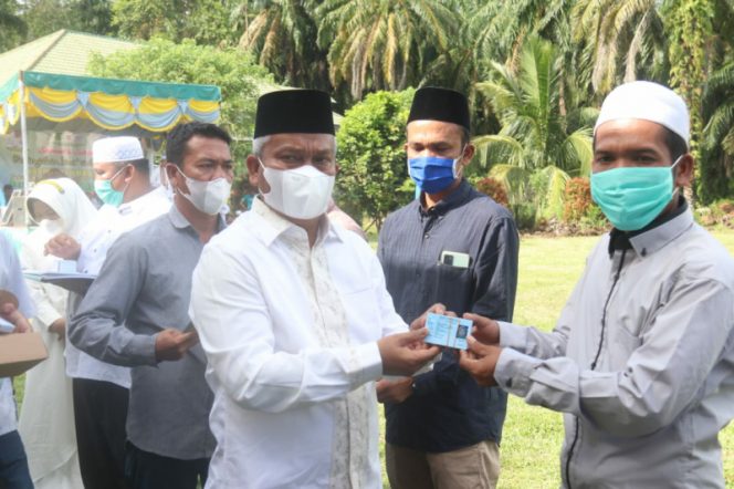 
					Plt. Bupati Palas Serahkan Dokumen Kependudukan Warga Yang Hilang Pasca Bencana