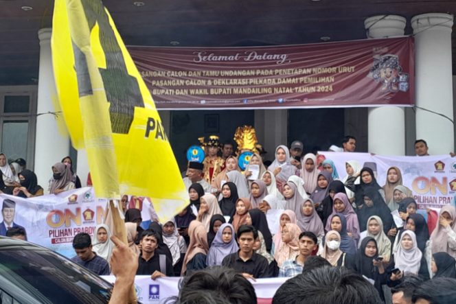 
					Semarak Pilkada Madina 2024, Seribuan Pendukung Paslon ONMA Kepung Gedung Serbanguna