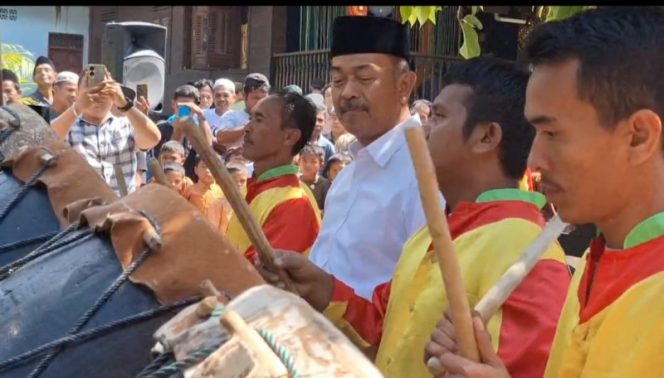 
					Saipullah Bermain Gordang Sambilan di Bagas Godang Gunung Baringin