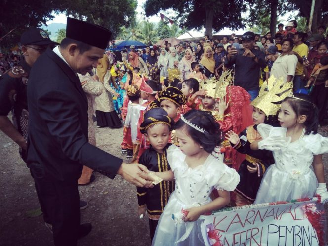 
					Pawai Karnaval Meriahkan HUT RI Ke – 80 Tahun 2025 di Nagajuang, Camat Berikan Saweran