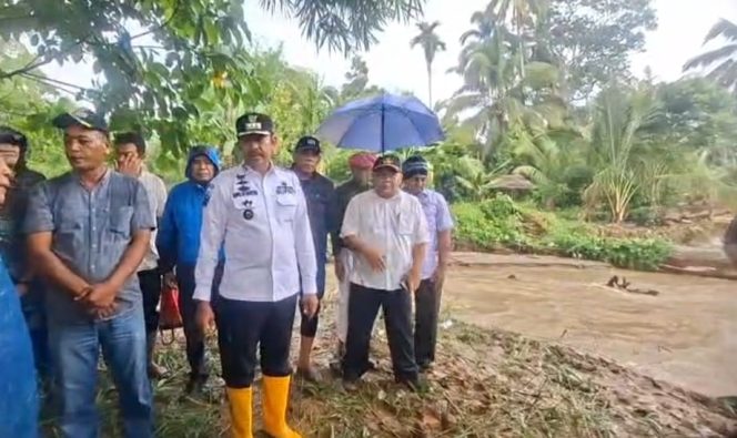 
					Besok, Alat Berat PUPR Perbaiki Tanggul Jebol Rendam 250 H Persawahan di Tangga Bosi